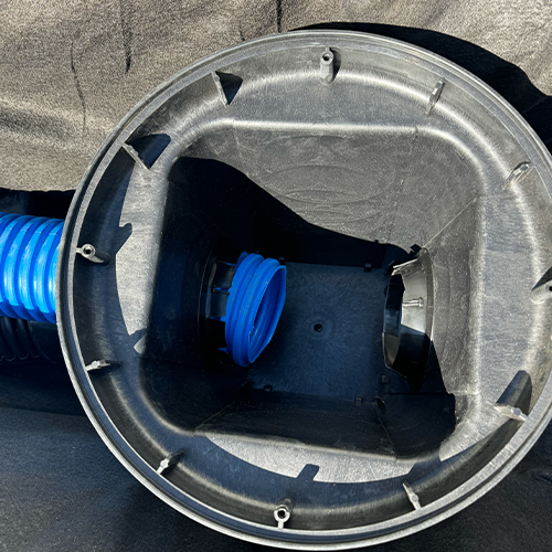 Pipe extending 3 ribs into basin